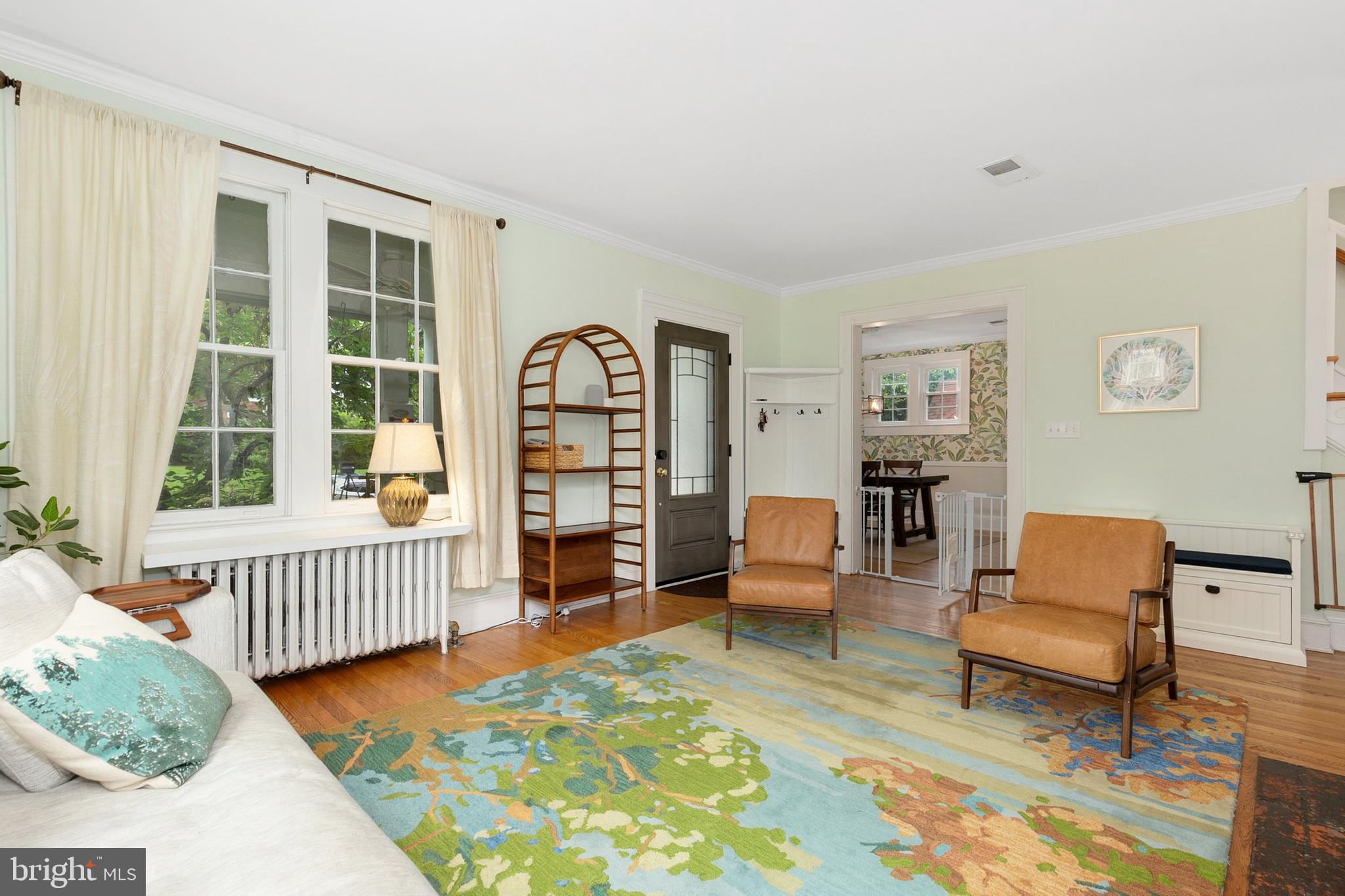 8601 Mayfair Place Silver Spring, MD 20910 - Photo 11 of 63 a bedroom with furniture and a rug