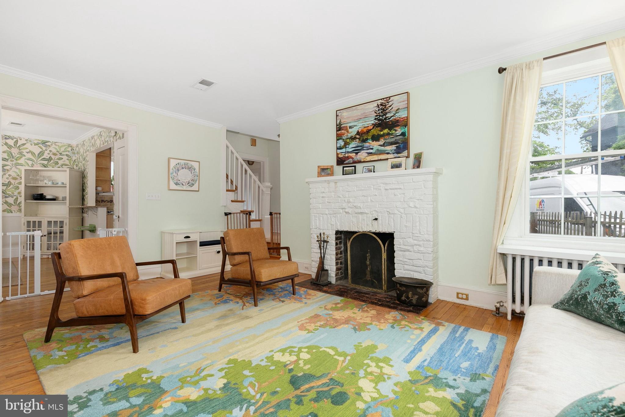 8601 Mayfair Place Silver Spring, MD 20910 - Photo 12 of 63 a living room with furniture and a fireplace
