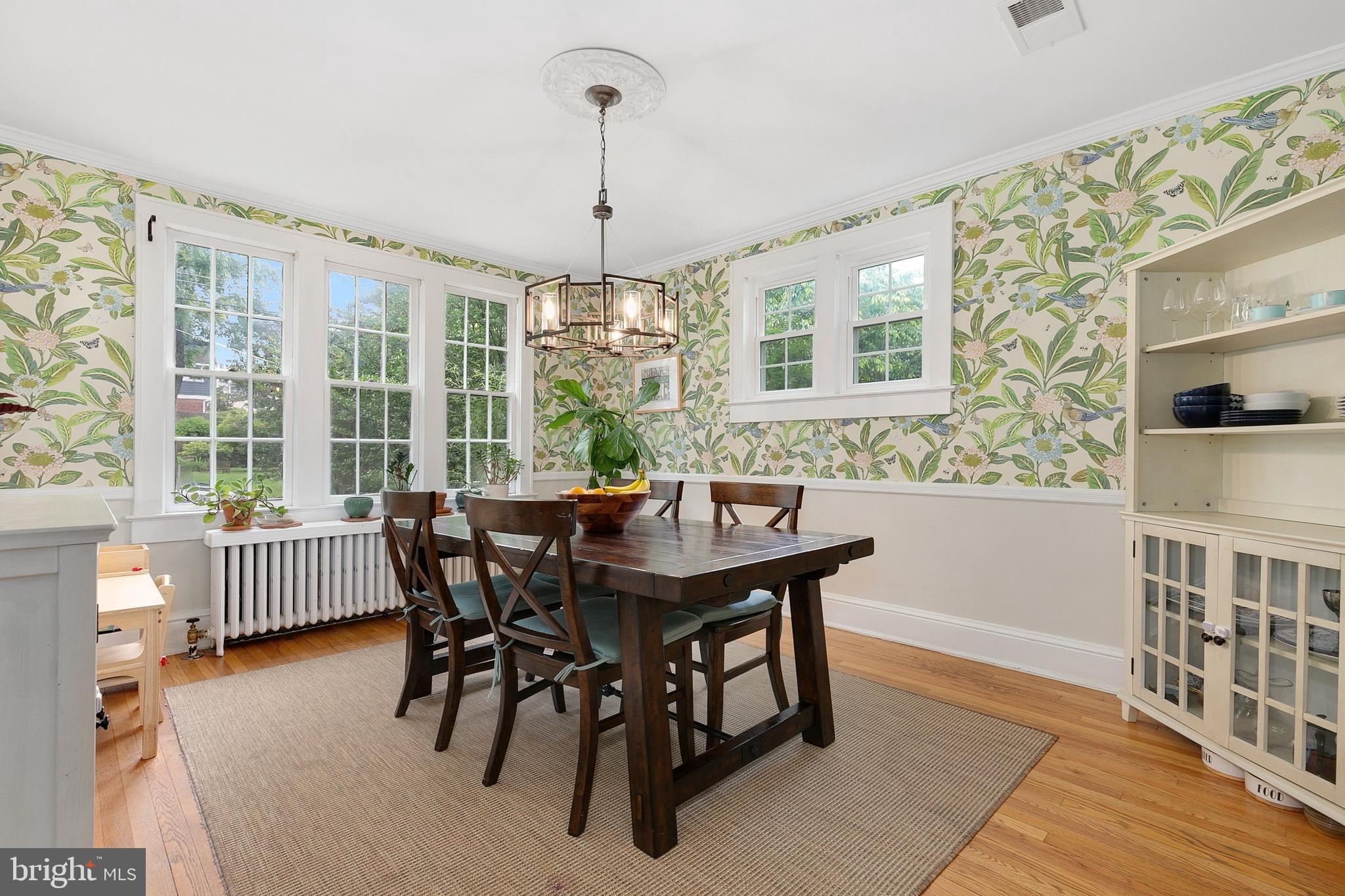 8601 Mayfair Place Silver Spring, MD 20910 - Photo 13 of 63 a view of a dining room with furniture window and wooden floor