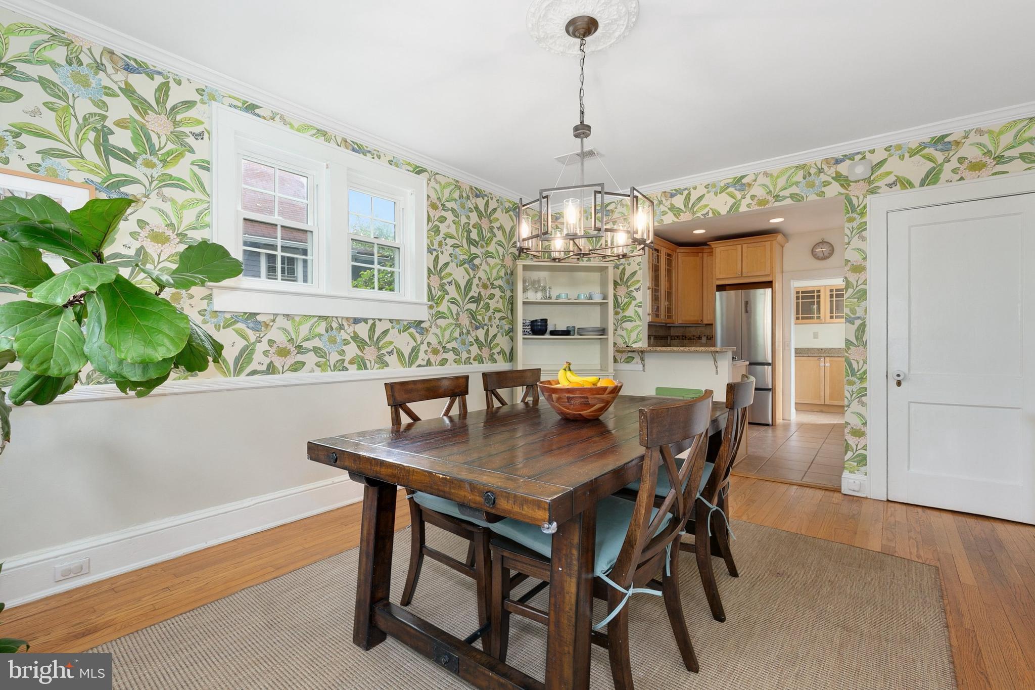 8601 Mayfair Place Silver Spring, MD 20910 - Photo 16 of 63 a view of a dining room with furniture and chandelier