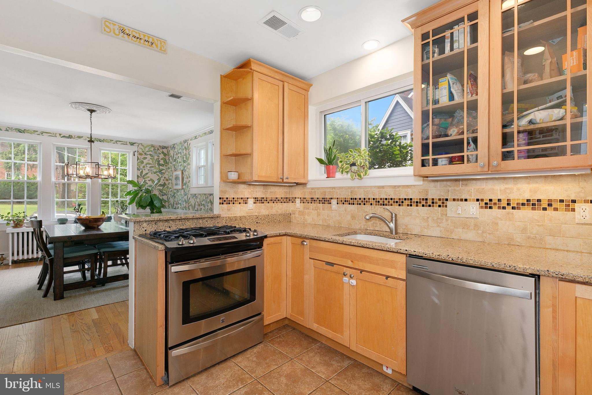 8601 Mayfair Place Silver Spring, MD 20910 - Photo 20 of 63 a kitchen with a stove top oven and sink