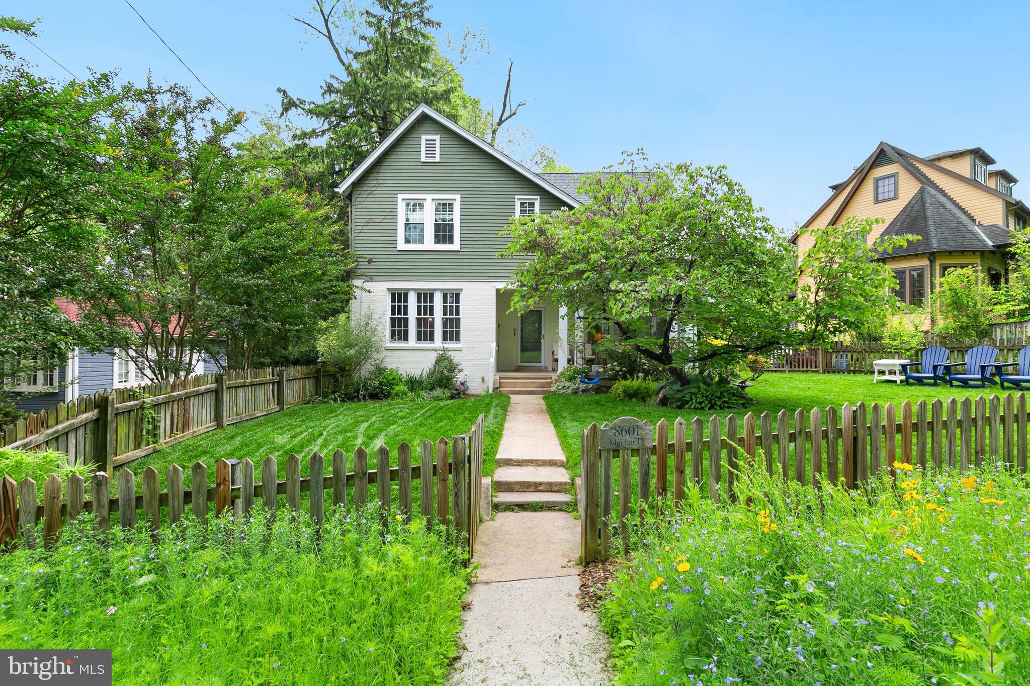 8601 Mayfair Place Silver Spring, MD 20910 - Photo 2 of 63 a view of a house with a yard and plants