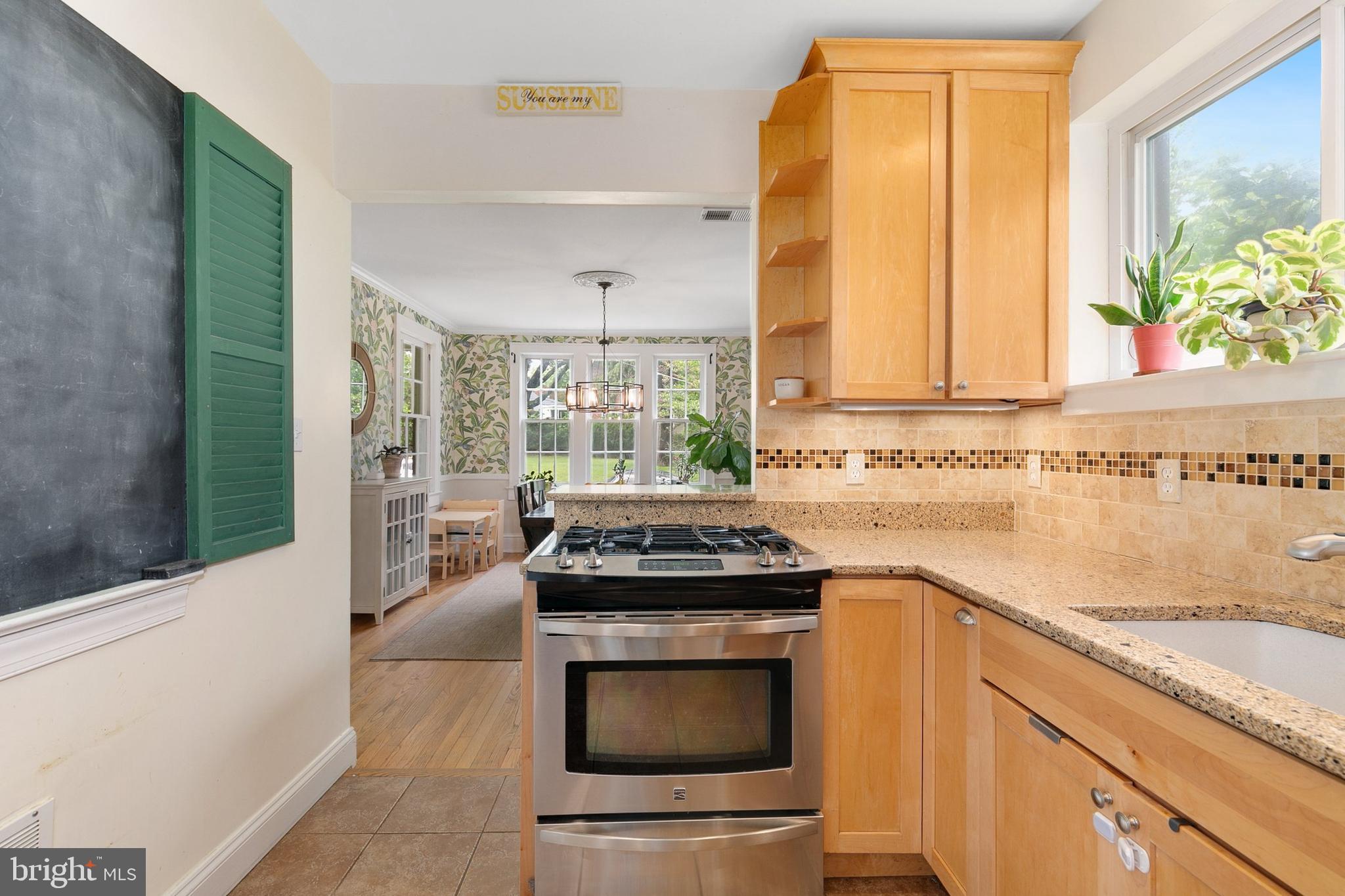 8601 Mayfair Place Silver Spring, MD 20910 - Photo 22 of 63 a kitchen with a stove and a sink
