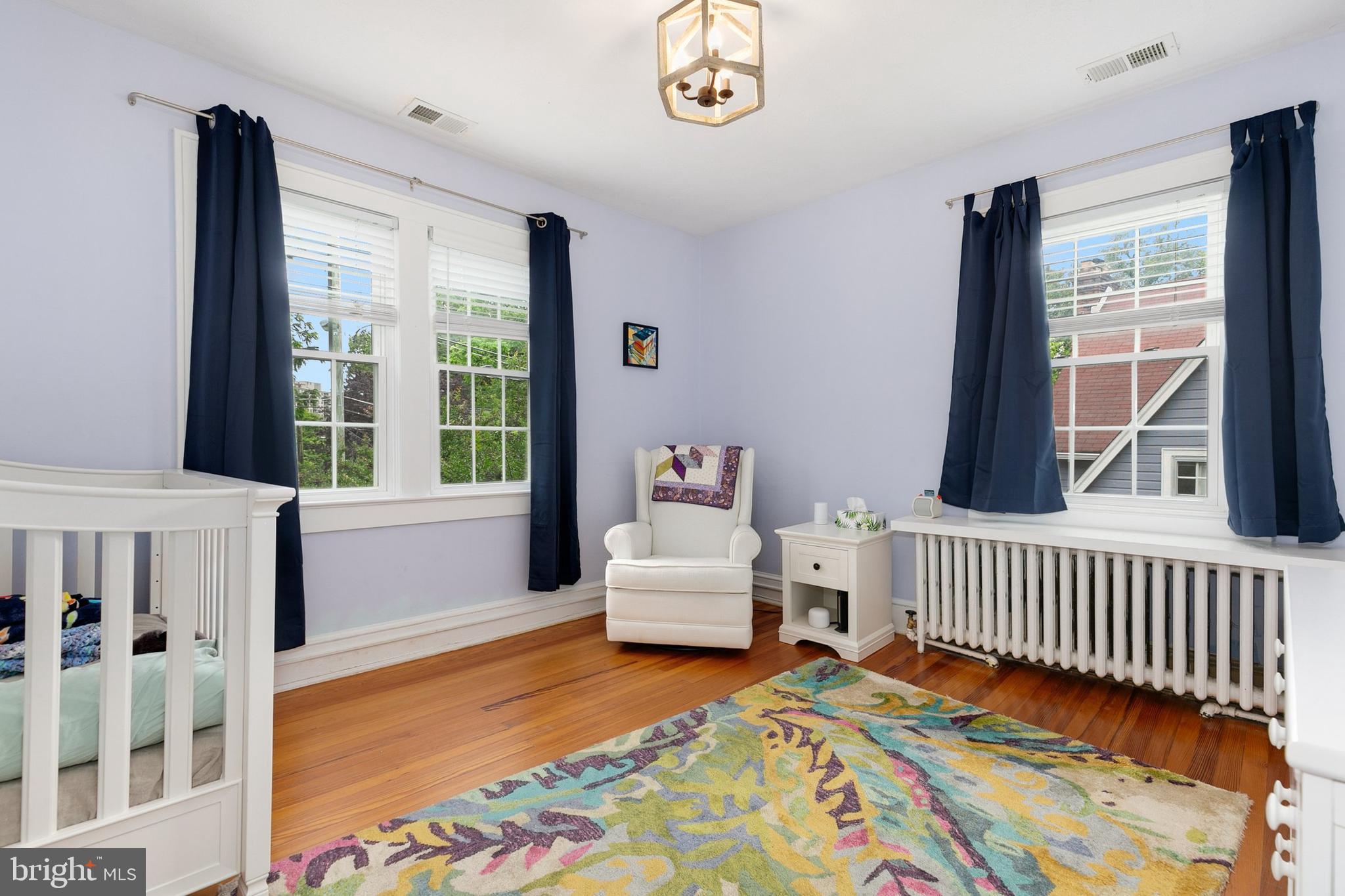 8601 Mayfair Place Silver Spring, MD 20910 - Photo 26 of 63 a bedroom with furniture and a window
