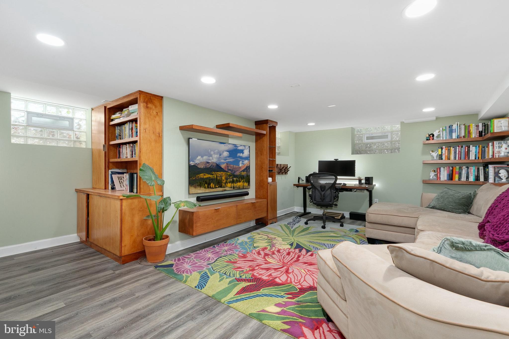 8601 Mayfair Place Silver Spring, MD 20910 - Photo 35 of 63 a bedroom with furniture and a book shelf