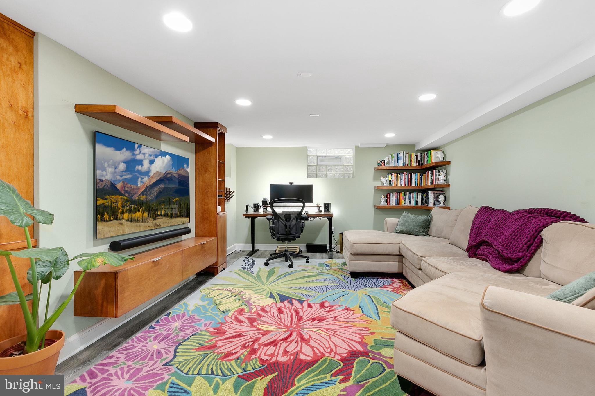8601 Mayfair Place Silver Spring, MD 20910 - Photo 36 of 63 a bedroom with furniture and a rug