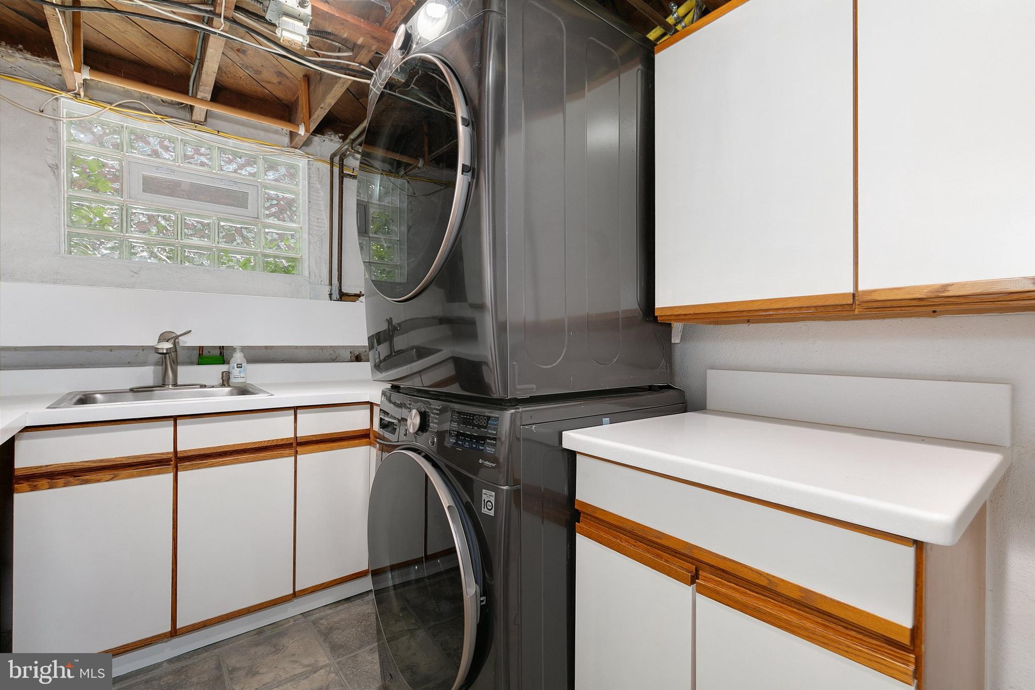 8601 Mayfair Place Silver Spring, MD 20910 - Photo 39 of 63 a utility room with dryer and washer