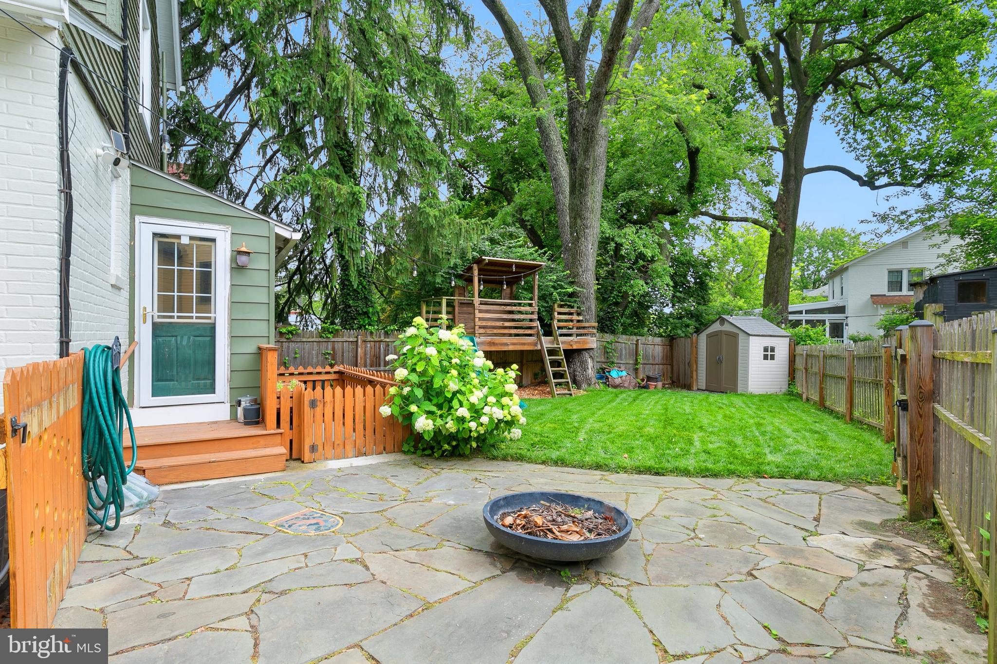 8601 Mayfair Place Silver Spring, MD 20910 - Photo 44 of 63 a view of a backyard with chair and tables