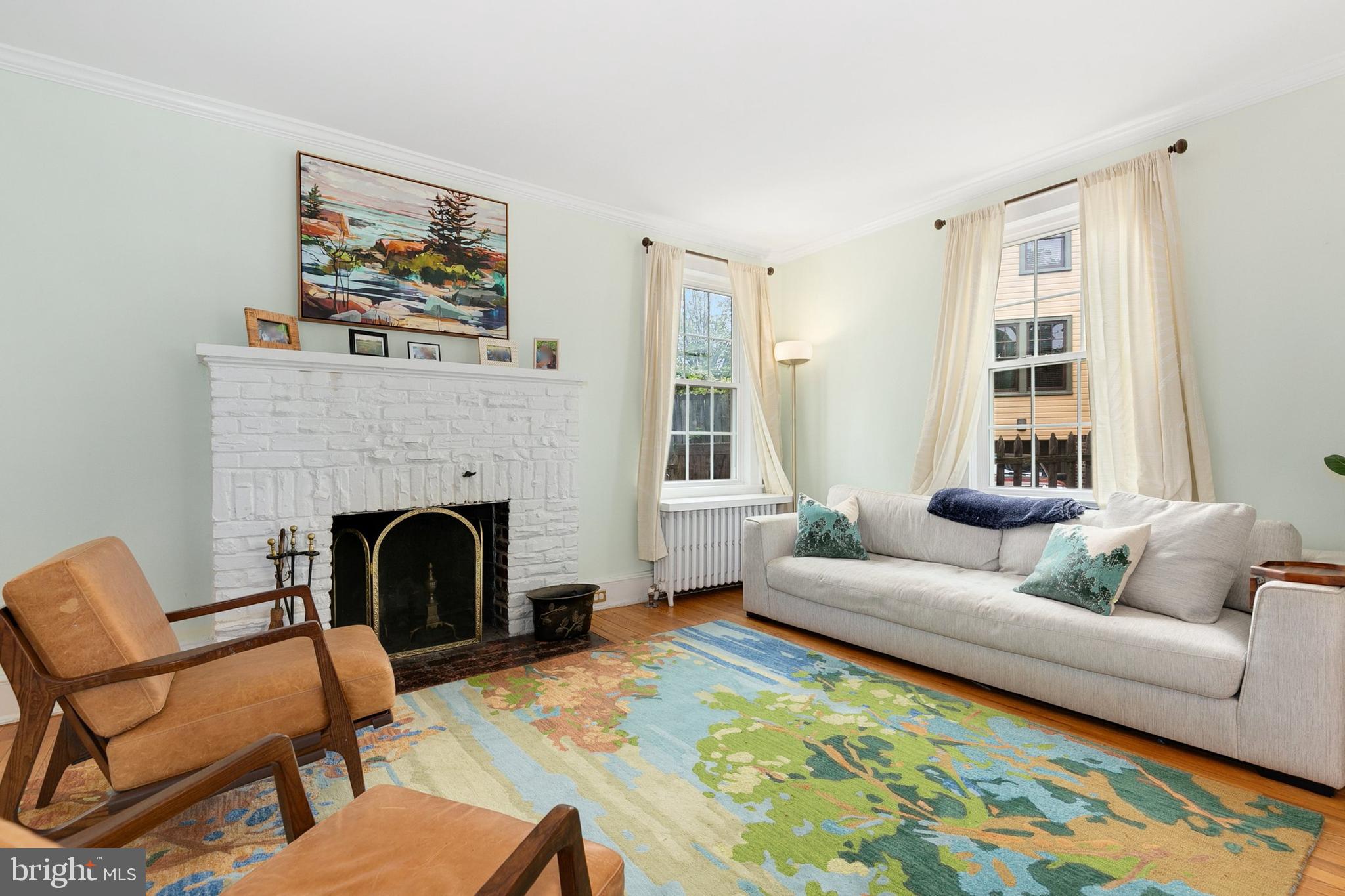 8601 Mayfair Place Silver Spring, MD 20910 - Photo 9 of 63 a living room with furniture and a fireplace