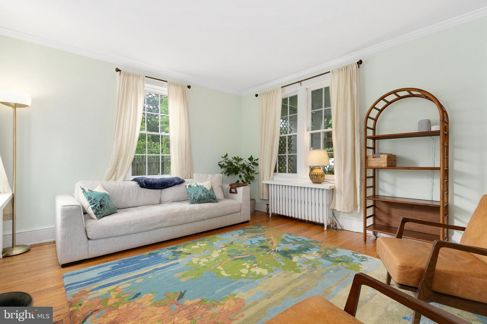 8601 Mayfair Place Silver Spring, MD 20910 - Photo 10 of 63 a living room with furniture and a window