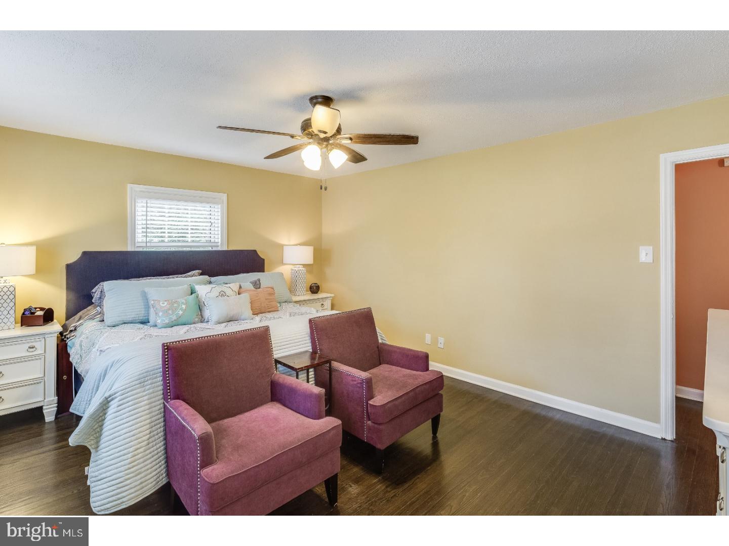 125 Colwick Road Cherry Hill, NJ 08002 - Photo 14 of 25 a living room with furniture and a ceiling fan