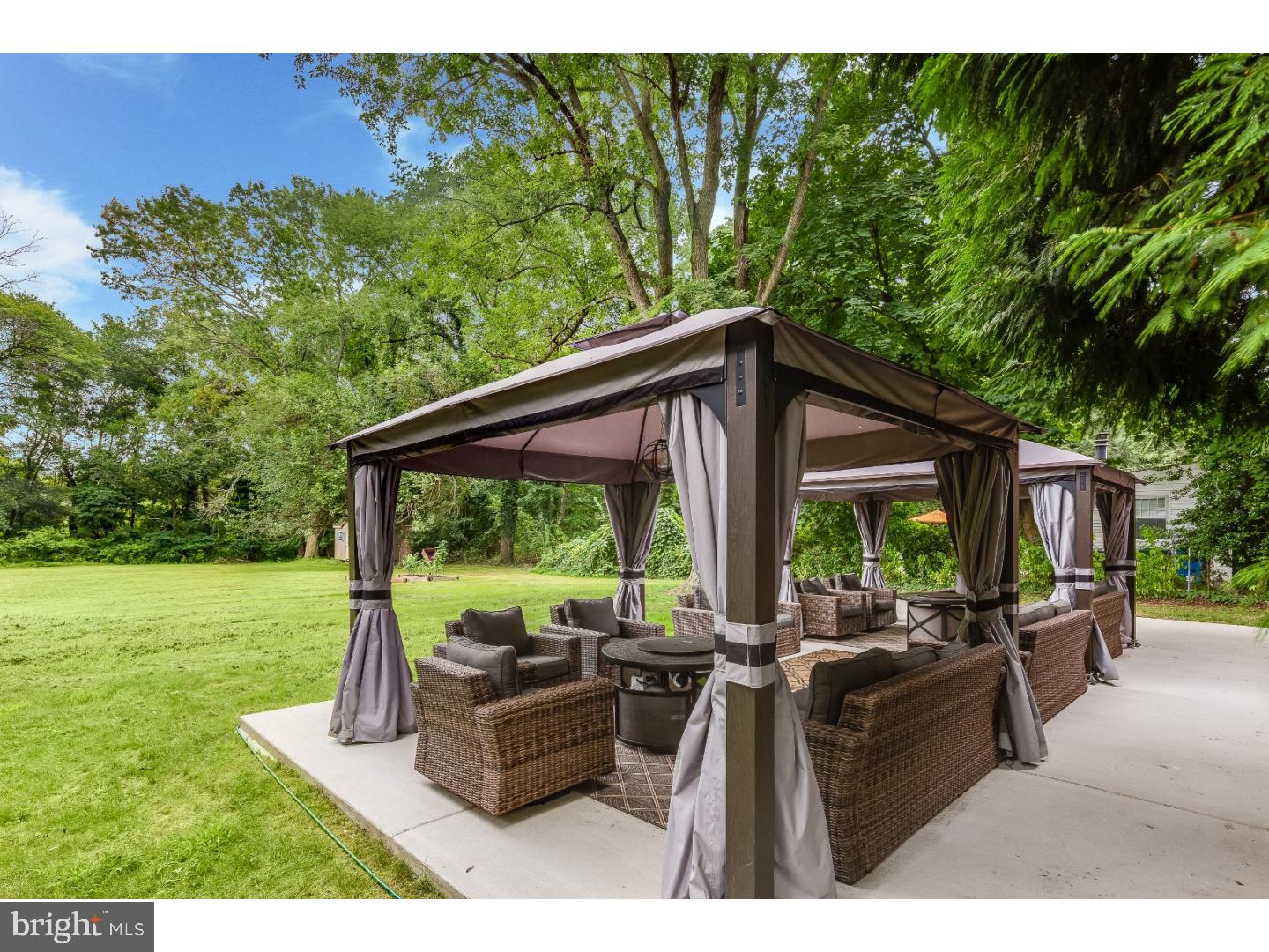 125 Colwick Road Cherry Hill, NJ 08002 - Photo 22 of 25 a backyard of a house with table and chairs
