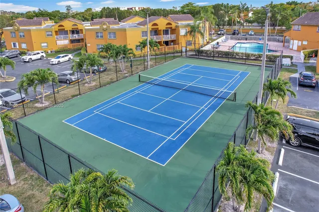 swimming pool view with a outdoor seating