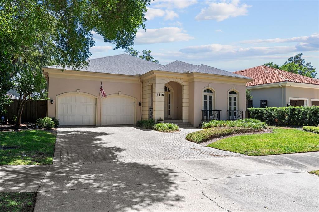 4518 West Woodmere Road Tampa, FL 33609 - Photo 1 of 1 a front view of a house with garden