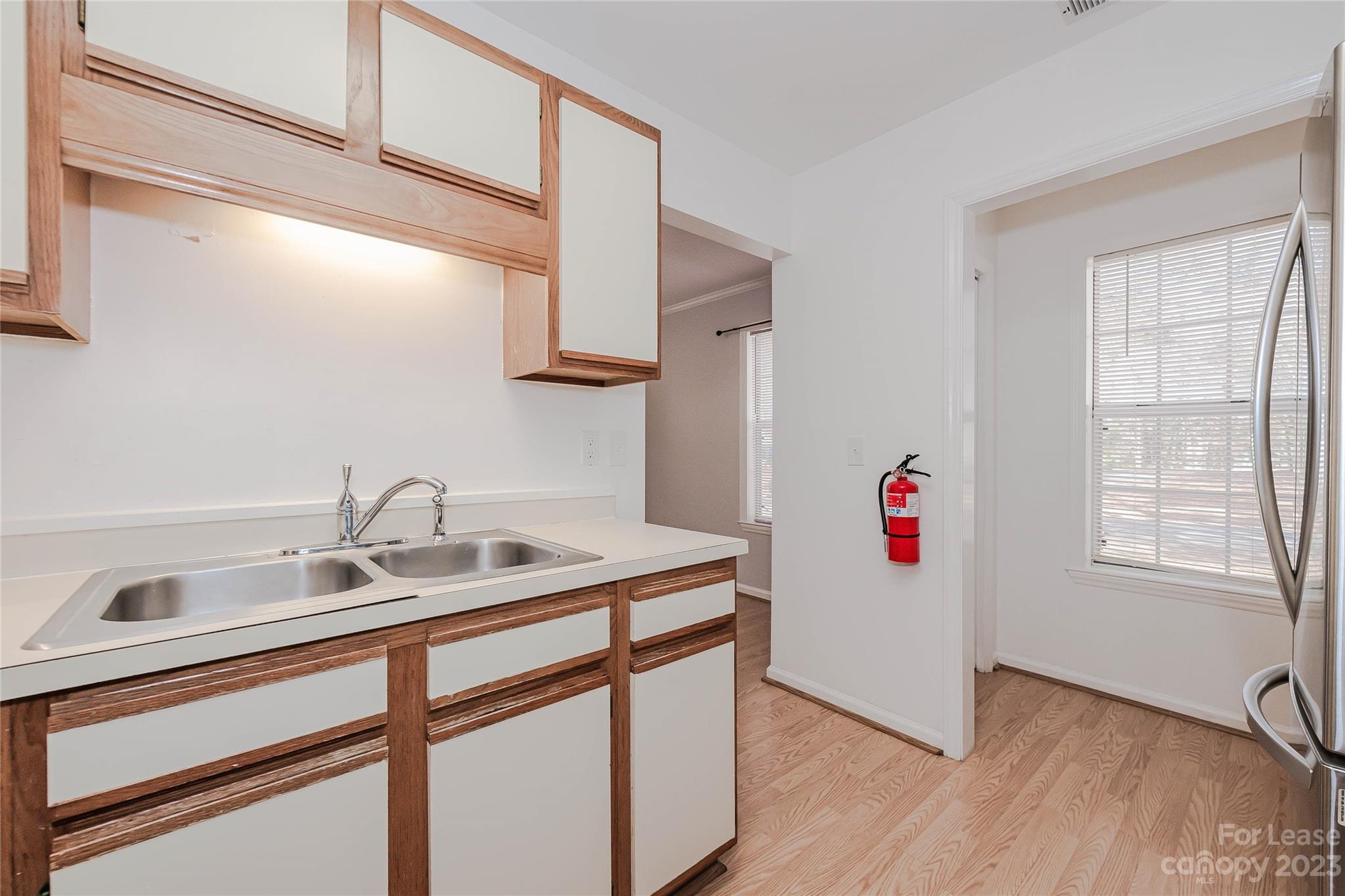 6619 Bevington Ridge Road, Unit A Charlotte, NC 28277 - Photo 14 of 27 a bathroom with a sink and a mirror