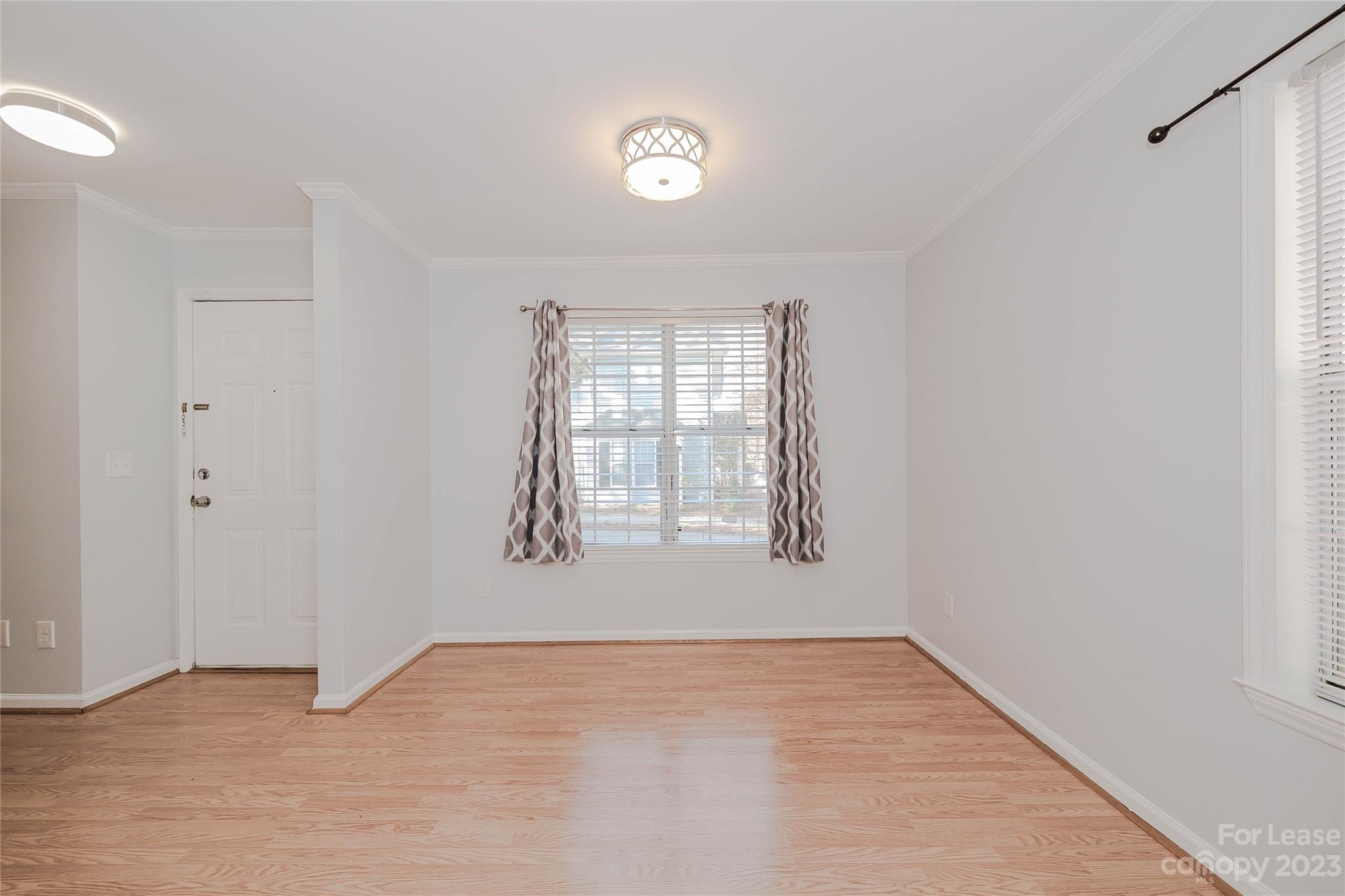 6619 Bevington Ridge Road, Unit A Charlotte, NC 28277 - Photo 15 of 27 a view of an empty room with a window