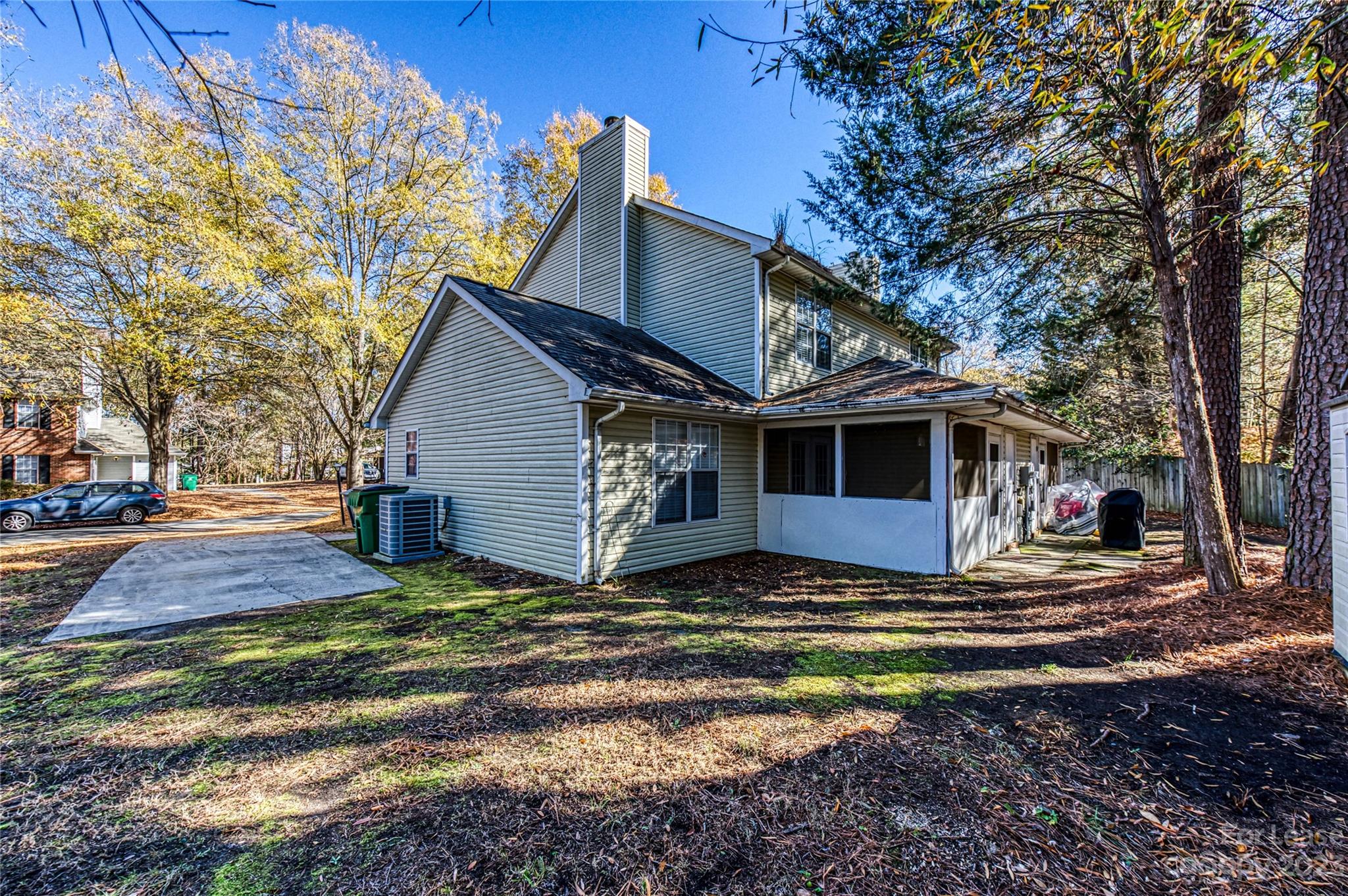 6619 Bevington Ridge Road, Unit A Charlotte, NC 28277 - Photo 26 of 27 a view of a house with a yard