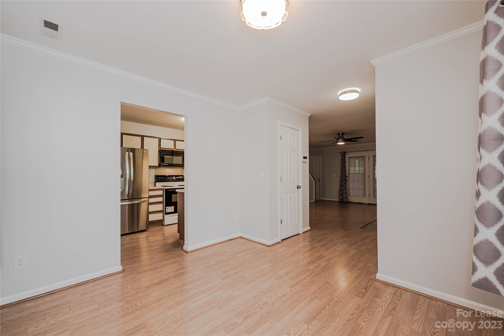 6619 Bevington Ridge Road, Unit A Charlotte, NC 28277 - Photo 10 of 27 wooden floor in an empty room