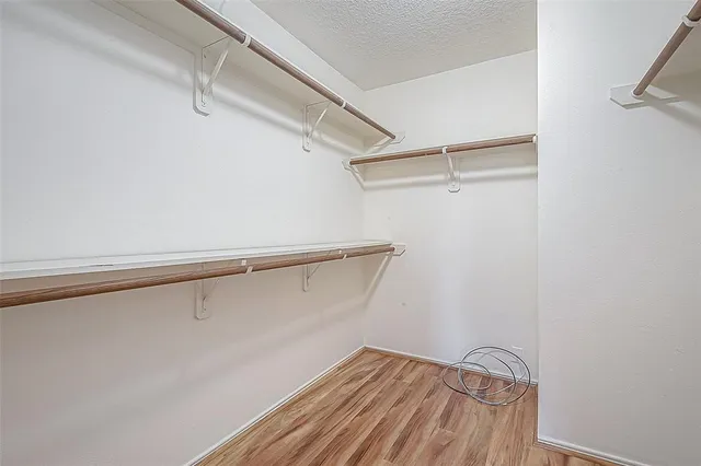 a view of a room with racks on the wall