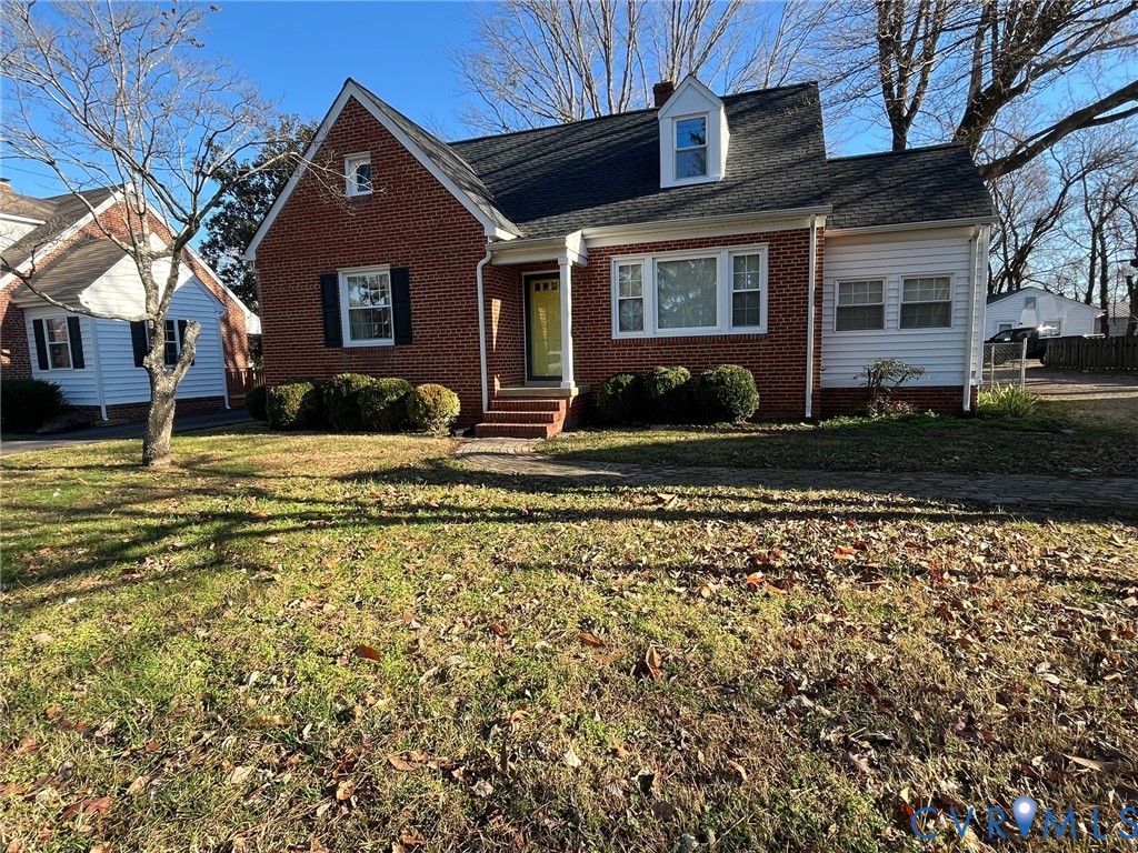 7318 Atlee Road Mechanicsville, VA 23111 - Photo 2 of 19 a front view of a house with a yard