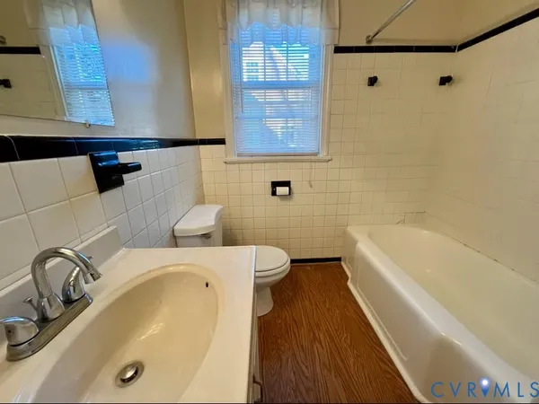 a bathroom with a sink and a bathtub
