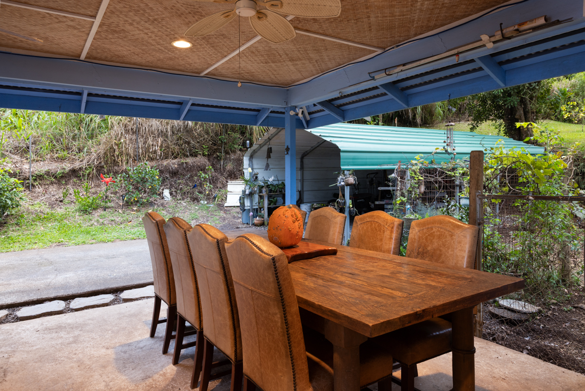 45-1006 Kalehua Road Honokaa, HI 96727 - Photo 22 of 29 a outdoor dining space with furniture and outdoor view