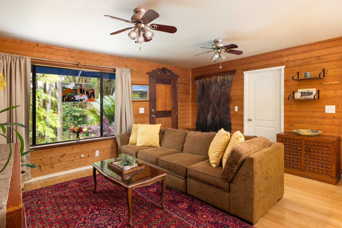 45-1006 Kalehua Road Honokaa, HI 96727 - Photo 5 of 29 a living room with furniture and a window