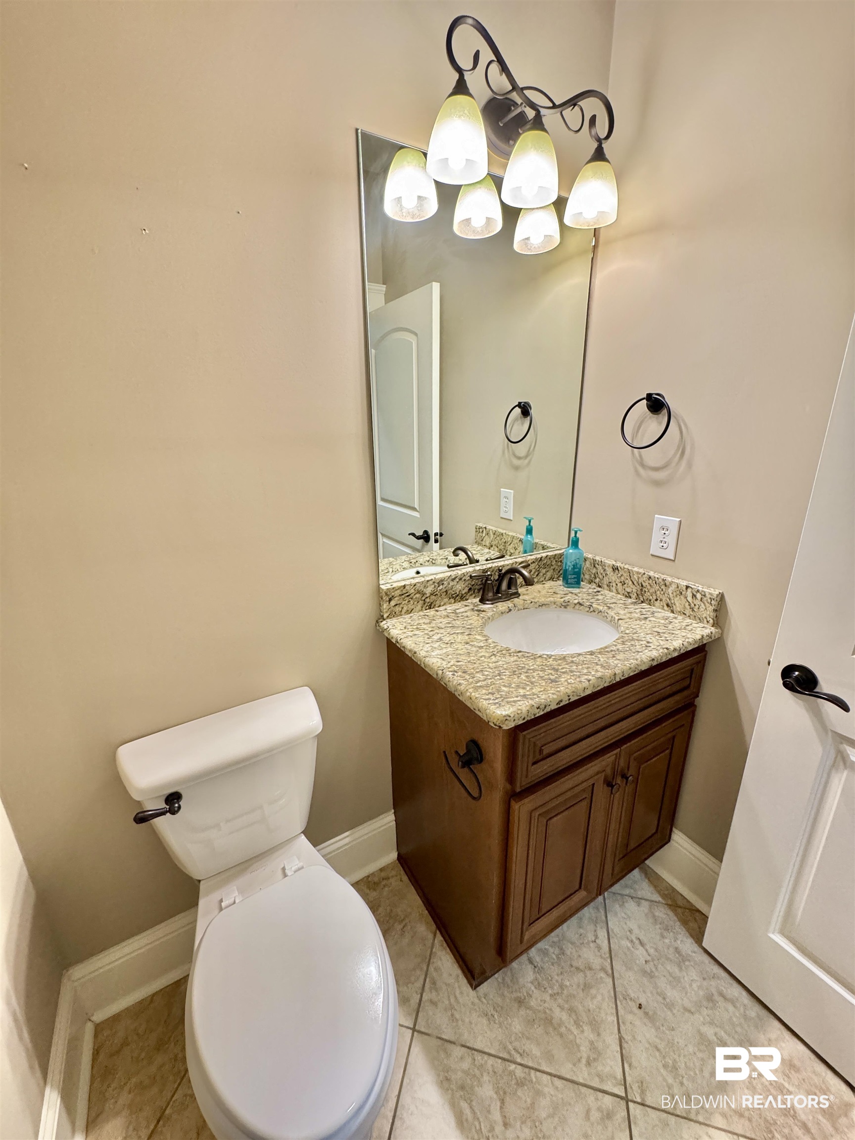 10846 County Road 138 Bay Minette, AL 36507 - Photo 28 of 53 Bathroom featuring vanity, toilet, and tile patterned flooring