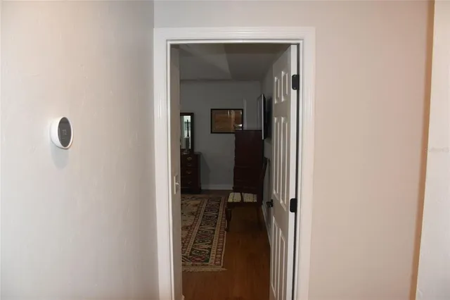 a bedroom with a bed and a table in it