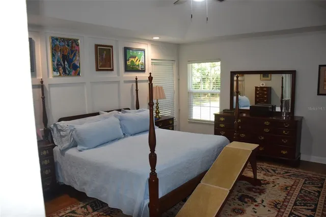 a bathroom with a shower sink and mirror