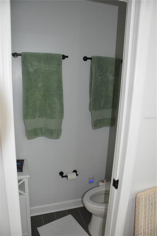 2031 Southwest 75th Terrace Gainesville, FL 32607 - Photo 26 of 45 a bathroom with a toilet and a shower