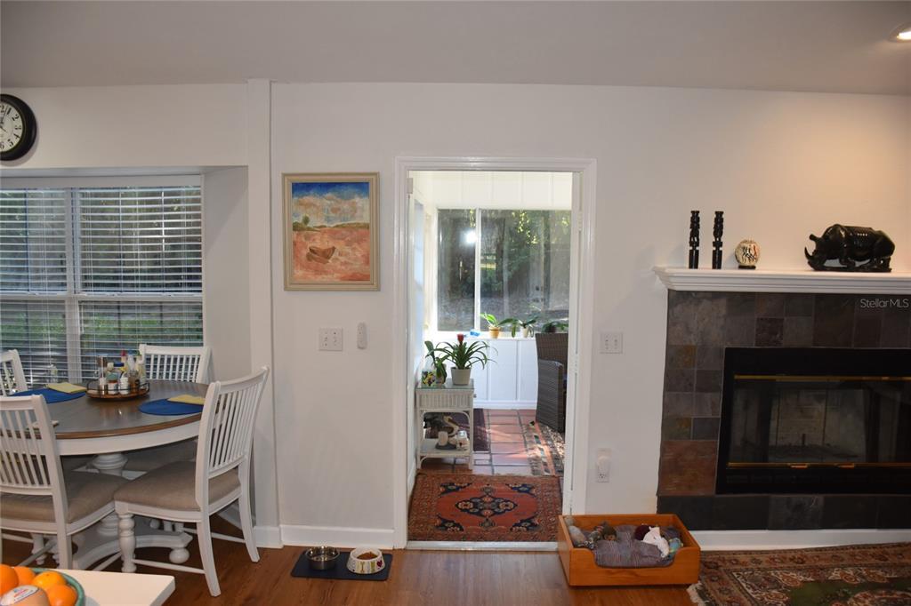 2031 Southwest 75th Terrace Gainesville, FL 32607 - Photo 42 of 45 a living room with furniture and a fireplace