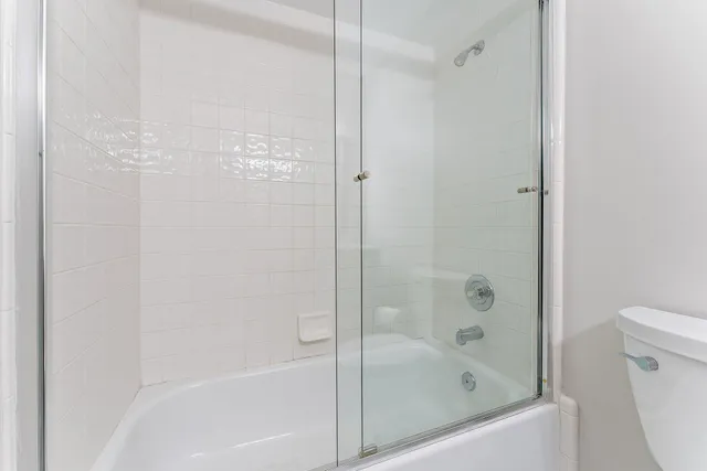 an aerial view of residential houses with outdoor space and street view