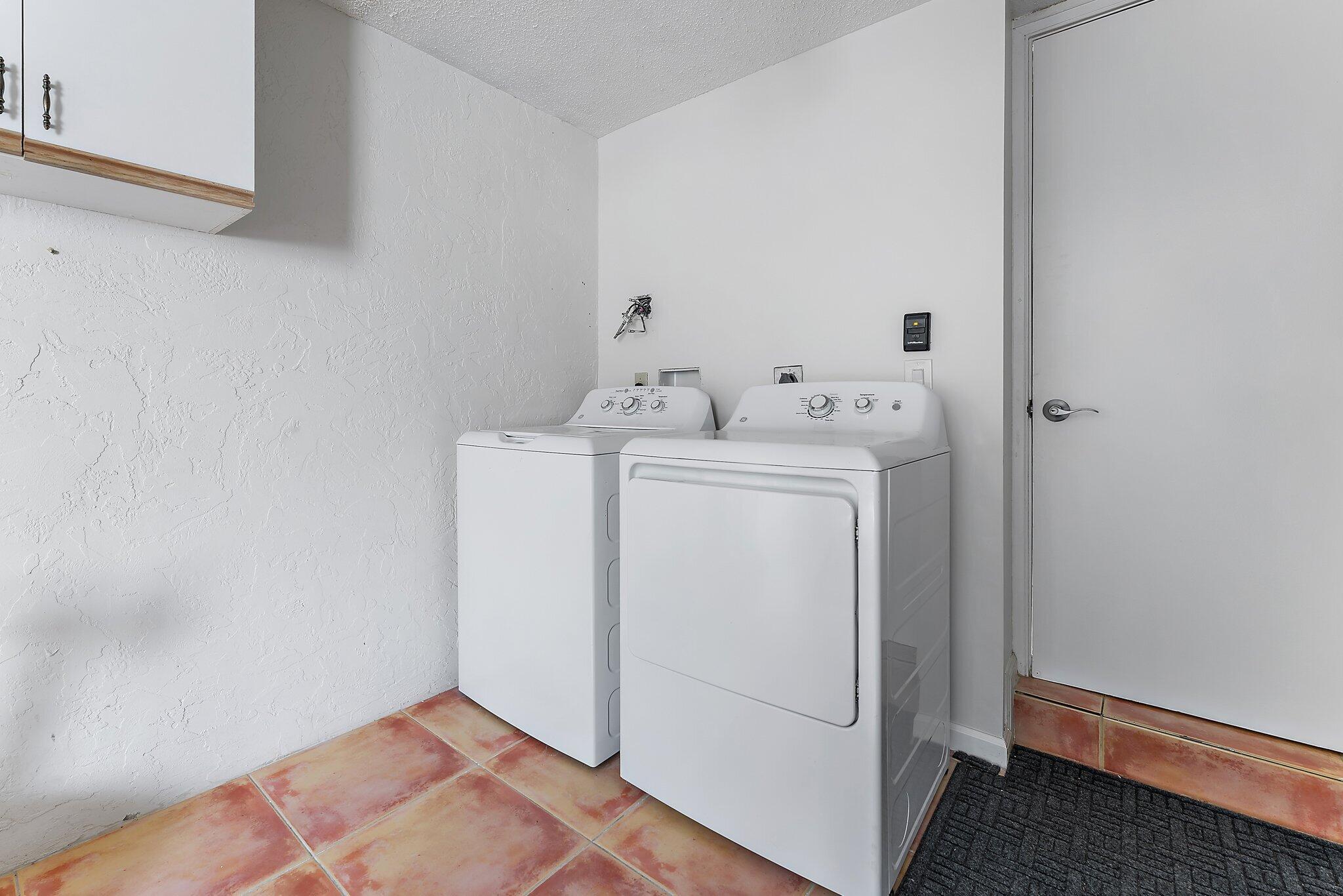 2905 Fairway Drive North Jupiter, FL 33477 - Photo 40 of 65 a utility room with dryer and washer