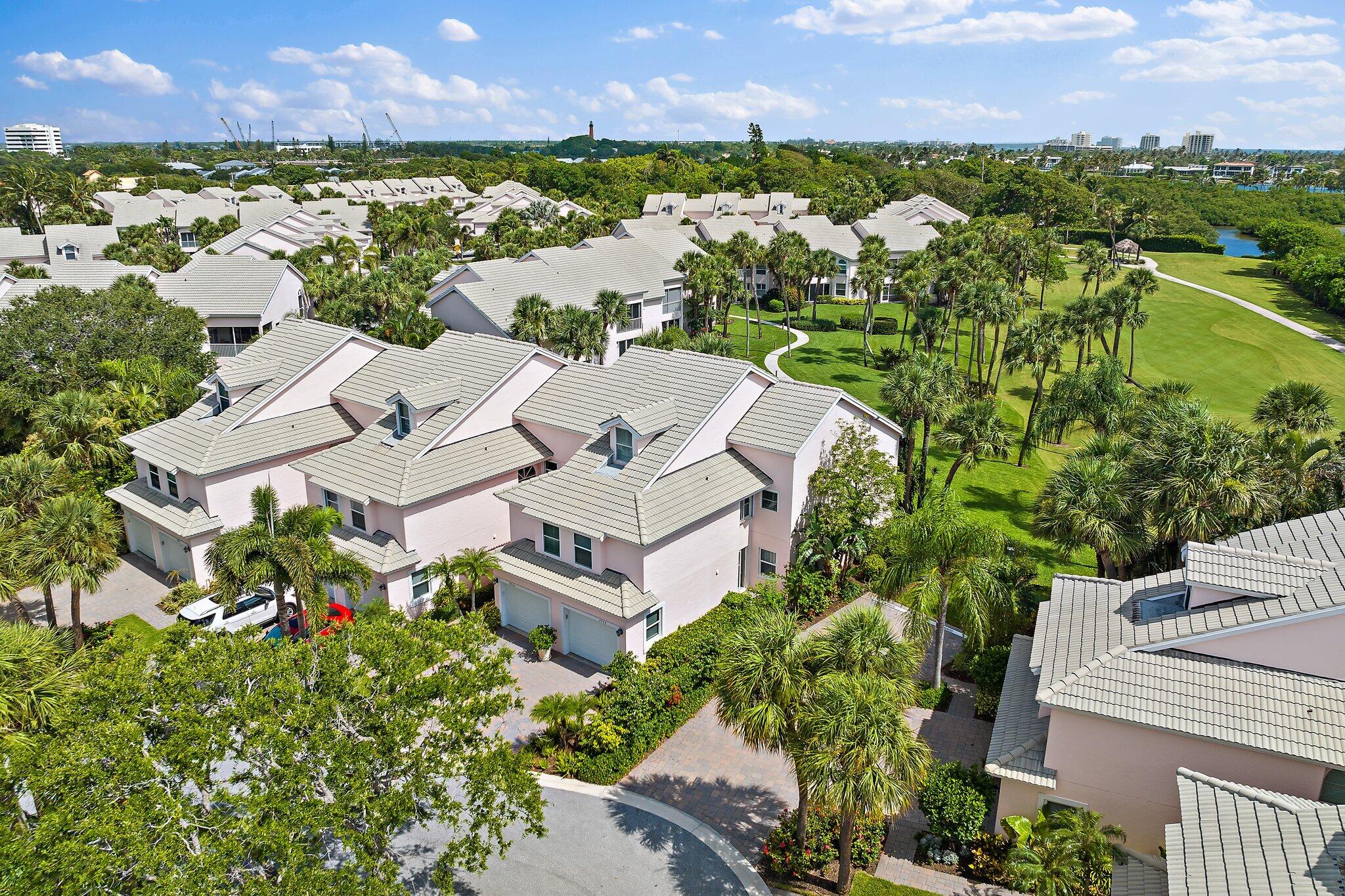 2905 Fairway Drive North Jupiter, FL 33477 - Photo 43 of 65 an aerial view of residential building with outdoor space and river