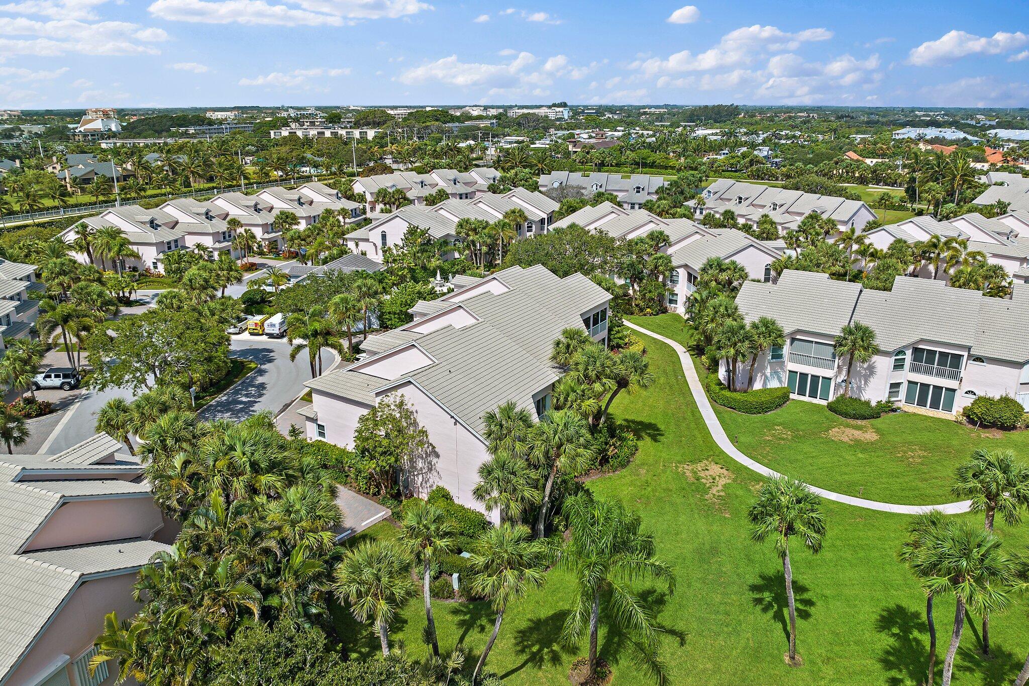 2905 Fairway Drive North Jupiter, FL 33477 - Photo 47 of 65 an aerial view of residential houses with outdoor space and street view