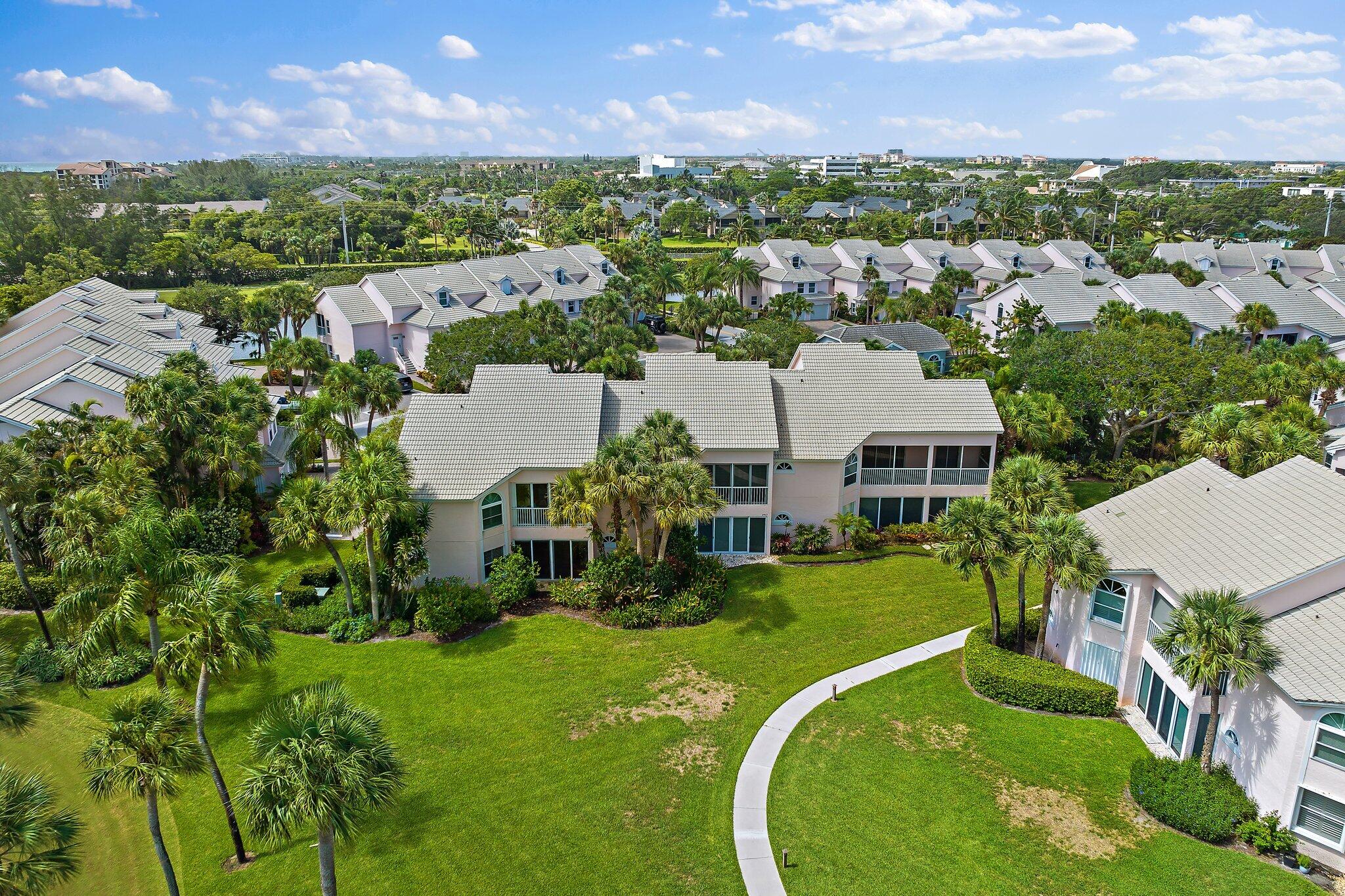 2905 Fairway Drive North Jupiter, FL 33477 - Photo 48 of 65 an aerial view of a house with a garden