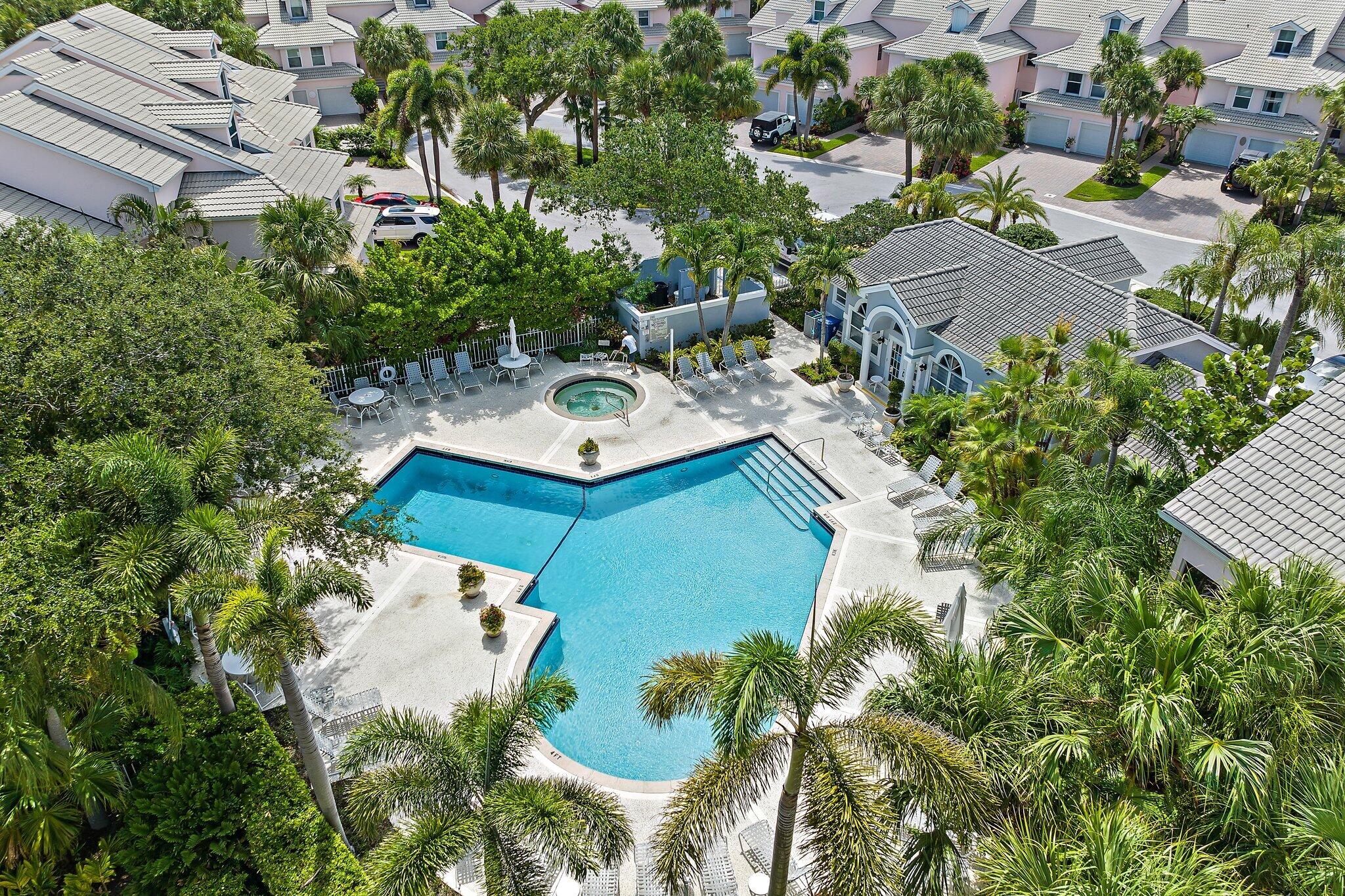 2905 Fairway Drive North Jupiter, FL 33477 - Photo 51 of 65 an aerial view of a house with yard swimming pool and outdoor seating