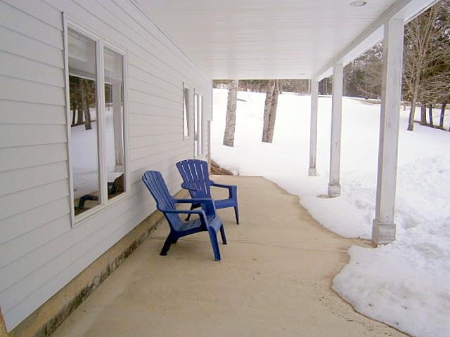 128 East Benton Road Waterville, ME 04901 - Photo 8 of 22 Covered patio on the front of the house