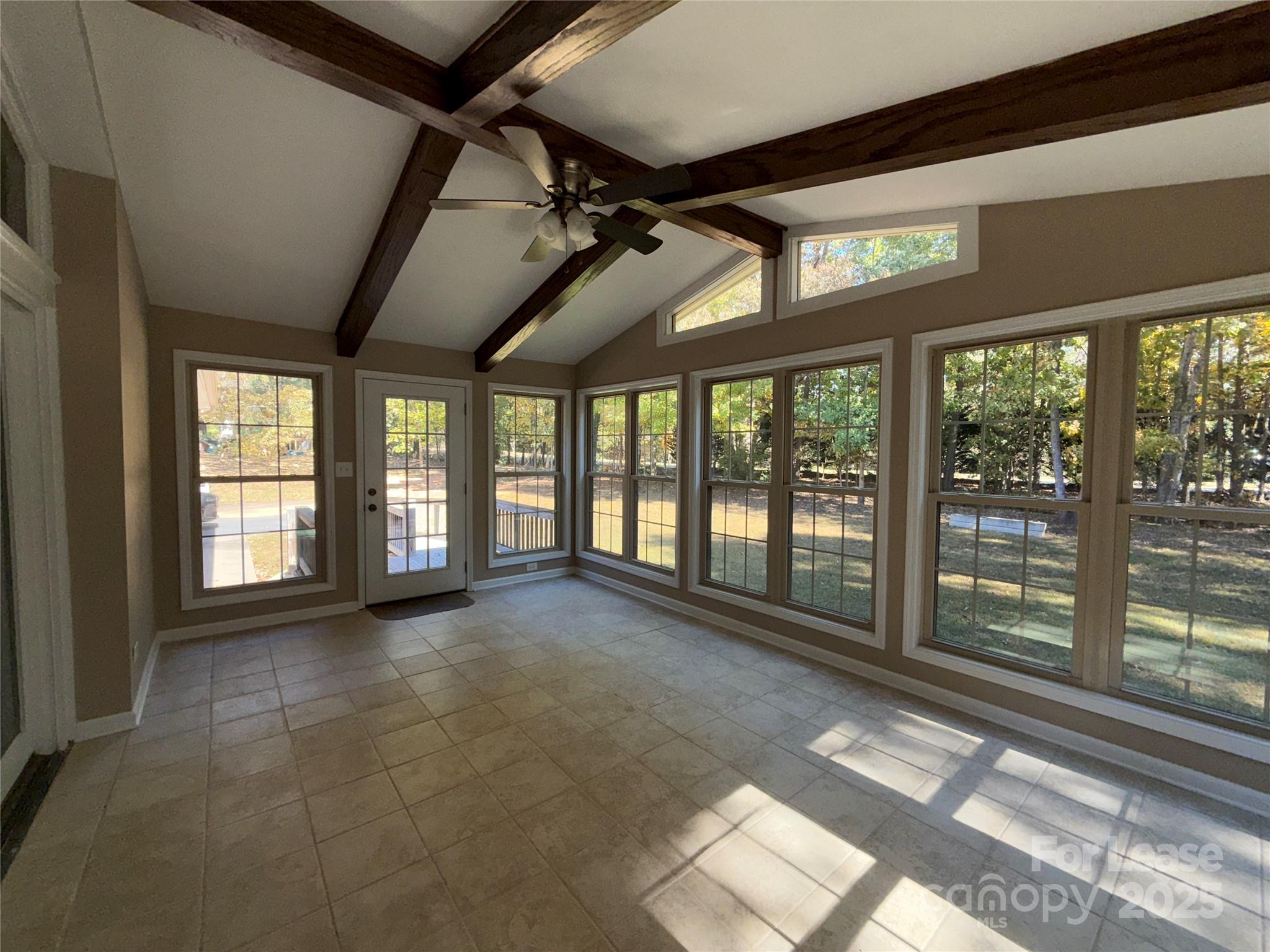 925 Perth Road Troutman, NC 28166 - Photo 15 of 31 a view of an empty room with a balcony