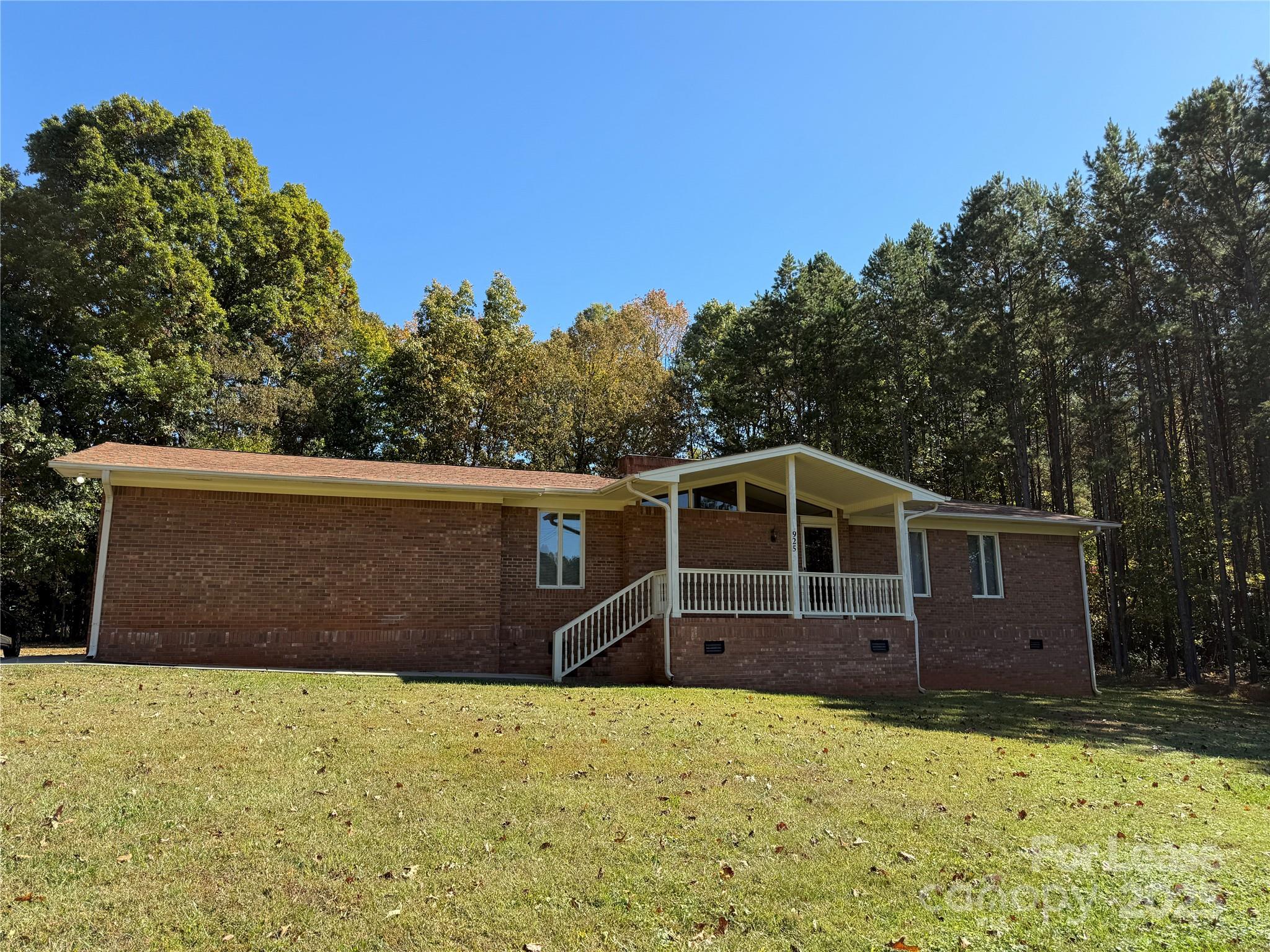925 Perth Road Troutman, NC 28166 - Photo 2 of 31 a front view of a house with a yard