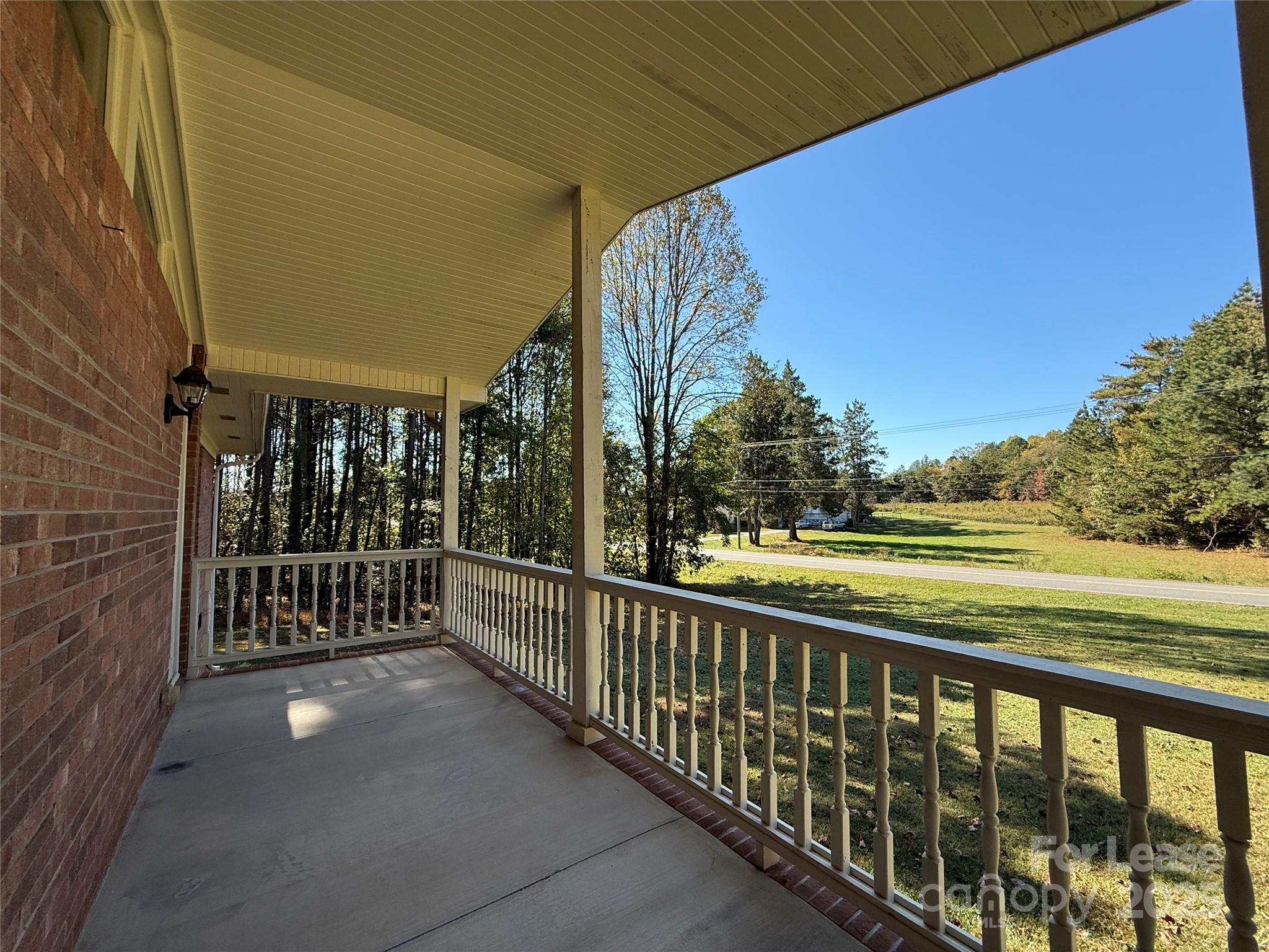 925 Perth Road Troutman, NC 28166 - Photo 3 of 31 a view of balcony with outdoor space
