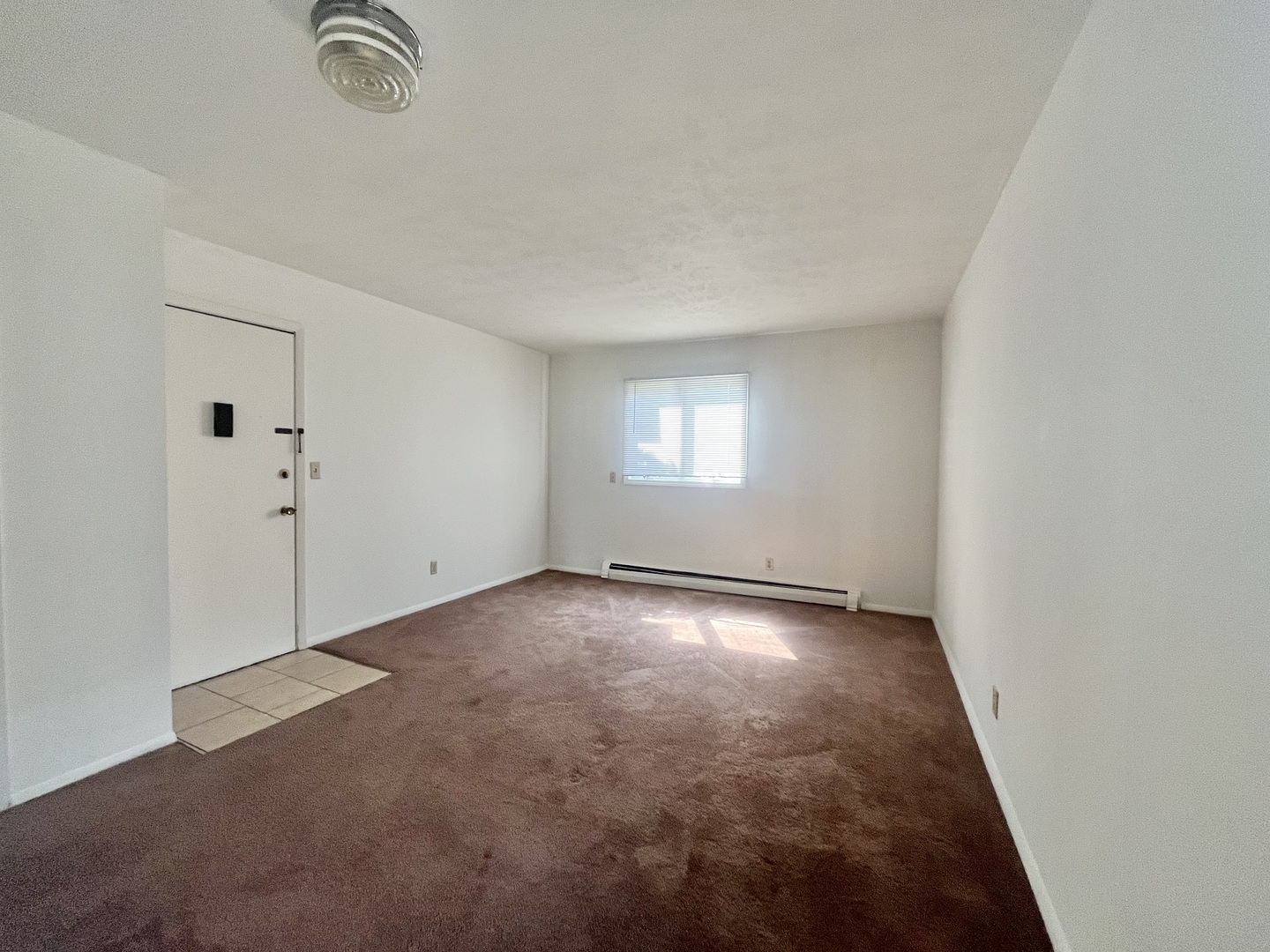 1006 Sheryl Lane Normal, IL 61761 - Photo 3 of 8 an empty room with windows