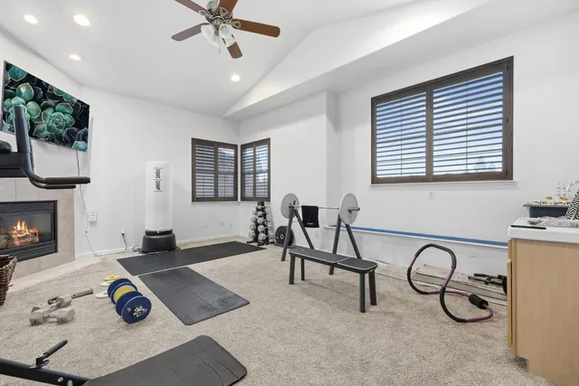 a room with furniture and a fireplace