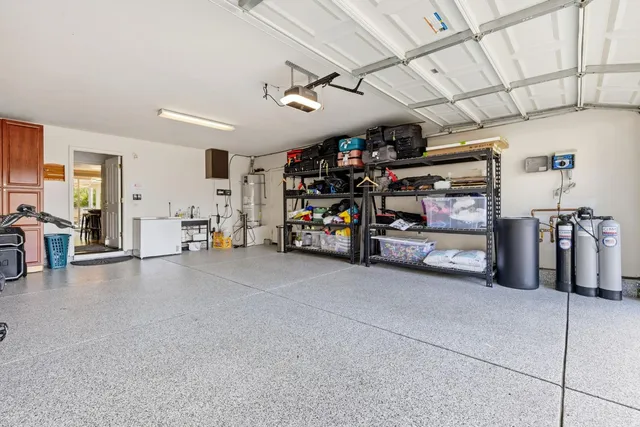 a view of a patio with a dining table and chairs