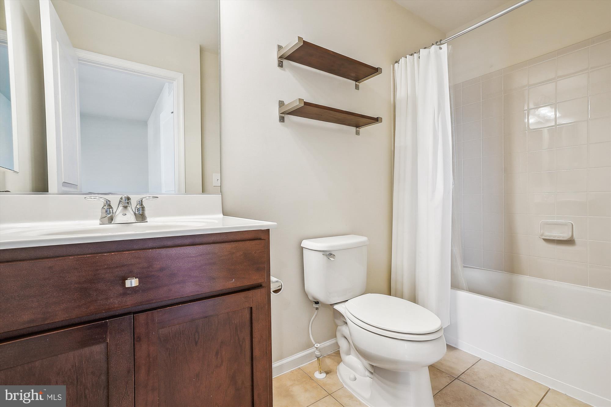 8359 Scotland Loop Manassas, VA 20109 - Photo 12 of 24 a bathroom with a sink toilet and shower