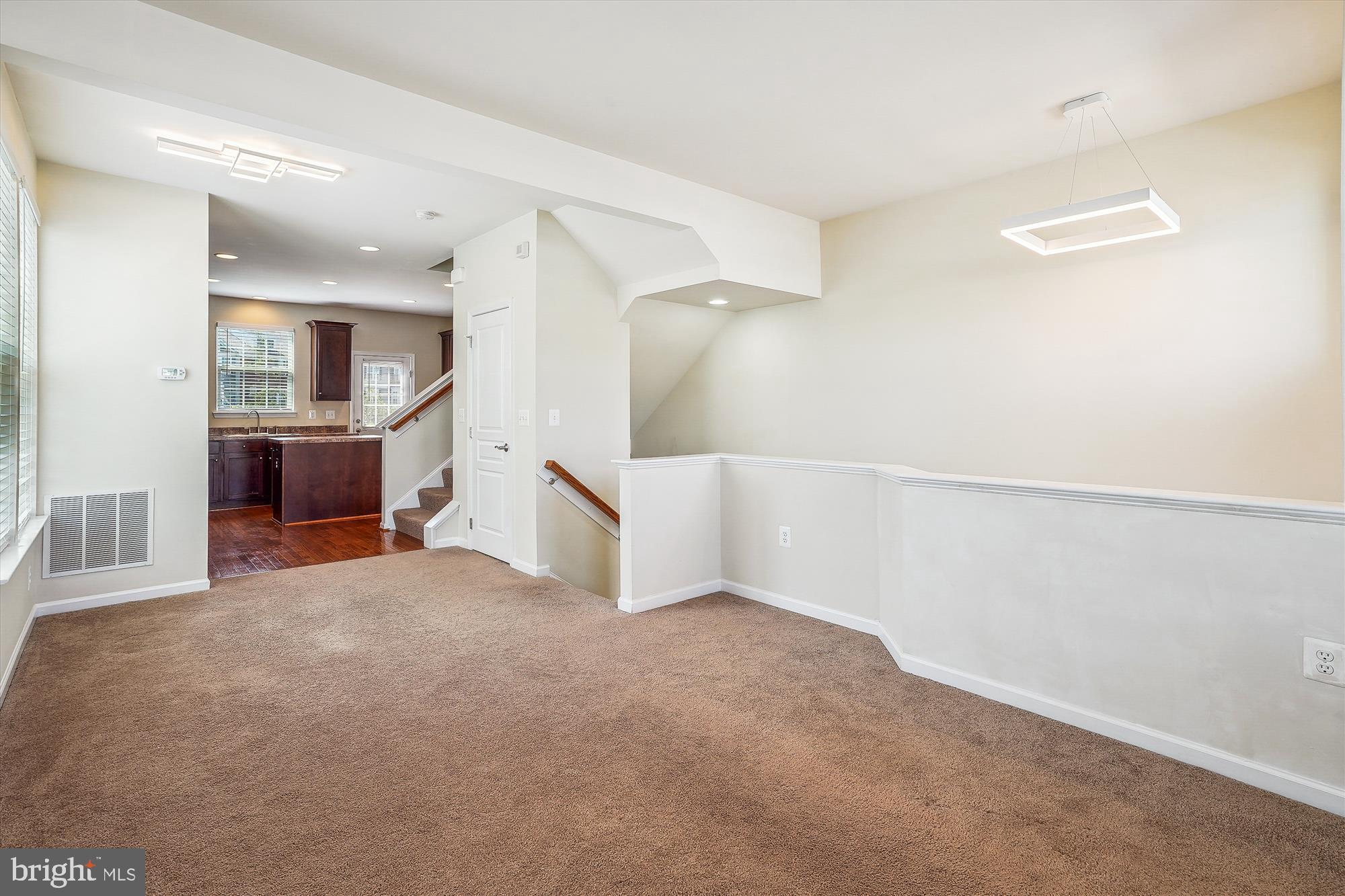 8359 Scotland Loop Manassas, VA 20109 - Photo 5 of 24 a view of a livingroom with an empty space