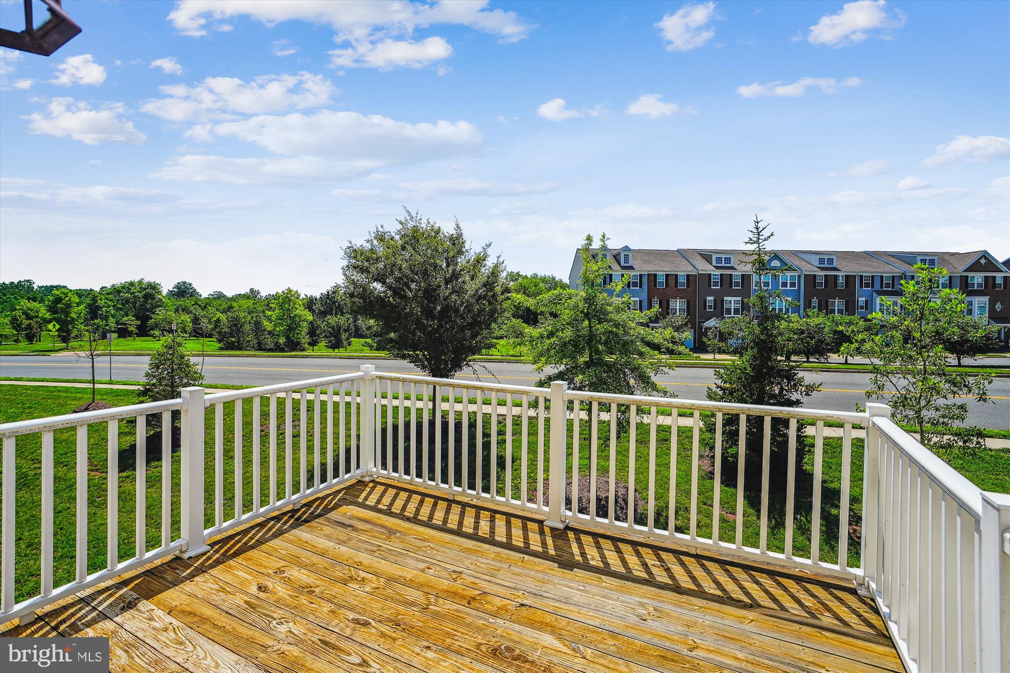 8359 Scotland Loop Manassas, VA 20109 - Photo 9 of 24 a view of a balcony with wooden floor