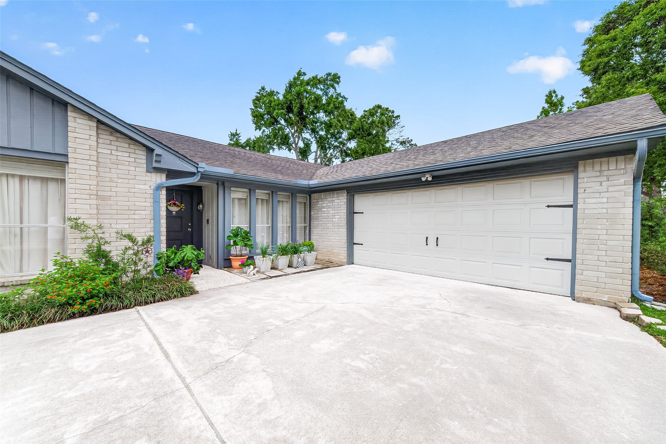 17611 Sorrell Ridge Drive Spring, TX 77388 - Photo 5 of 50 a front view of a house with a yard and garage