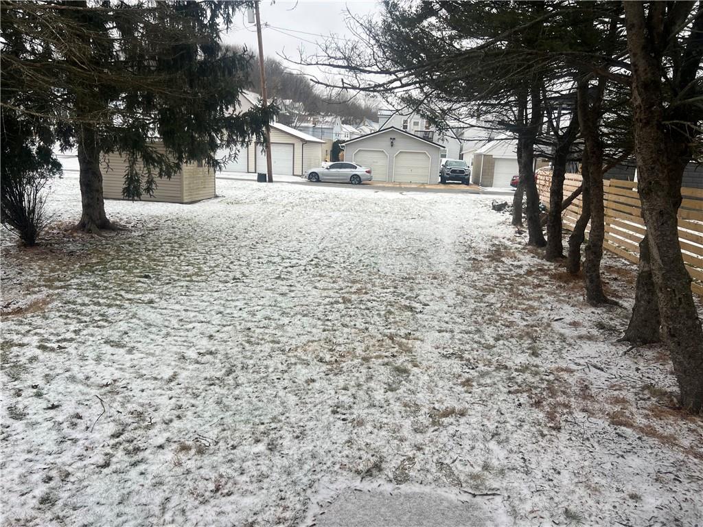 1020 Poe Street Vandergrift, PA 15690 - Photo 3 of 16 a pathway of a house with a yard